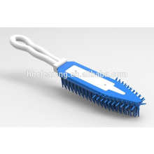 Pet hair removal and grooming brush with TPR bristle